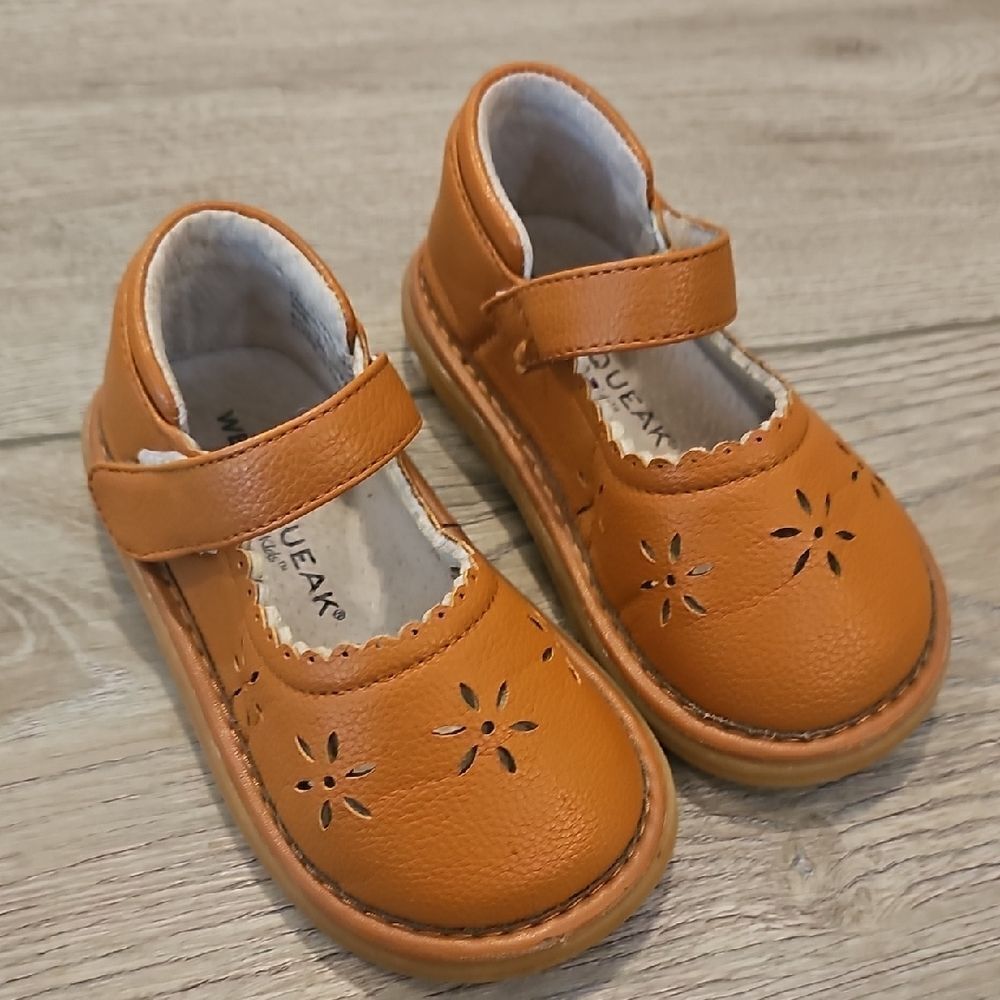 Brown Dress Shoes with Floral Cutouts and Adjustable Strap